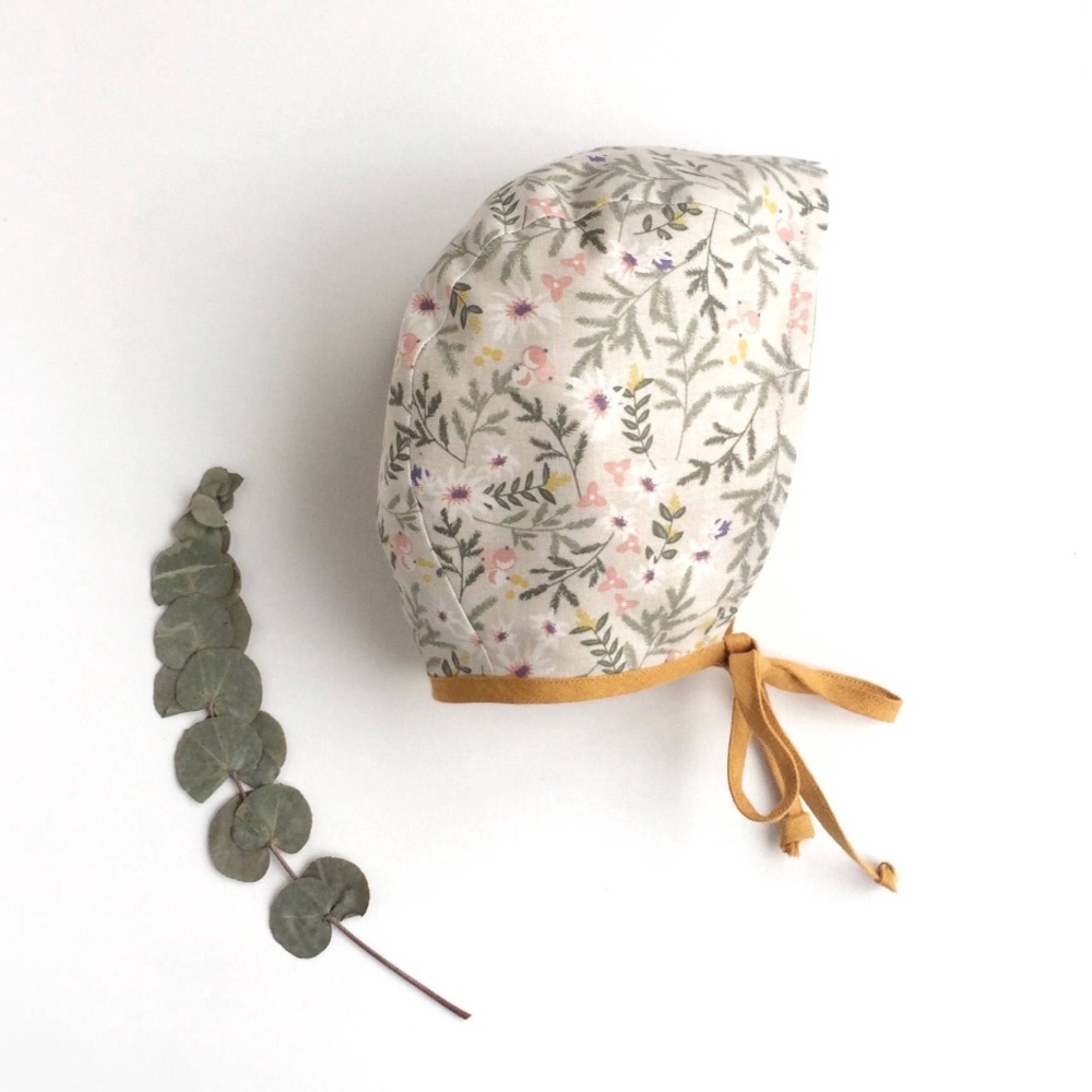 mustard and floral linen reversible baby bonnet